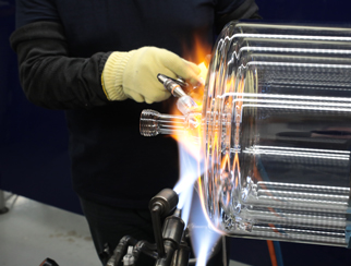 Glass blower forming a chemistry glass, closeup view, glass blower using a glassblowing  torch Stock Photo - Alamy