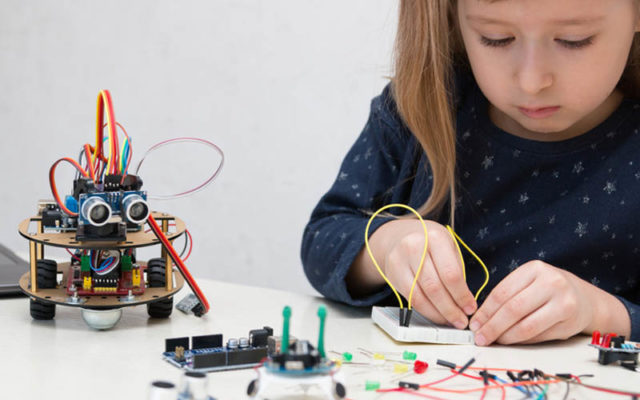 Girl fixing machine