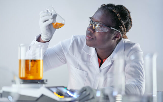 Scientist with Hei-PLATE